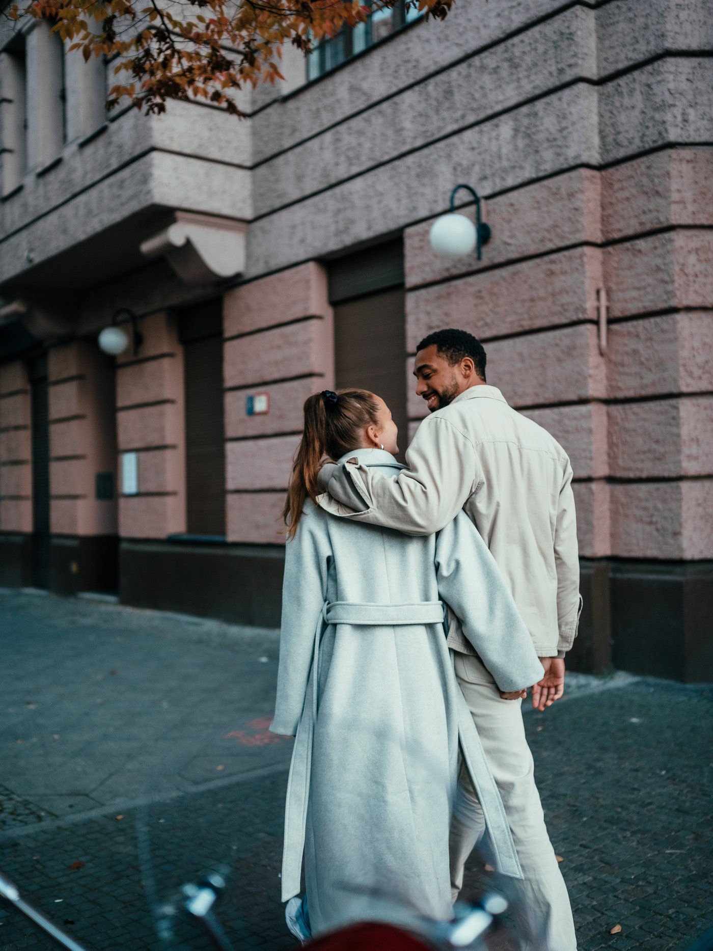 Couple walking a city street